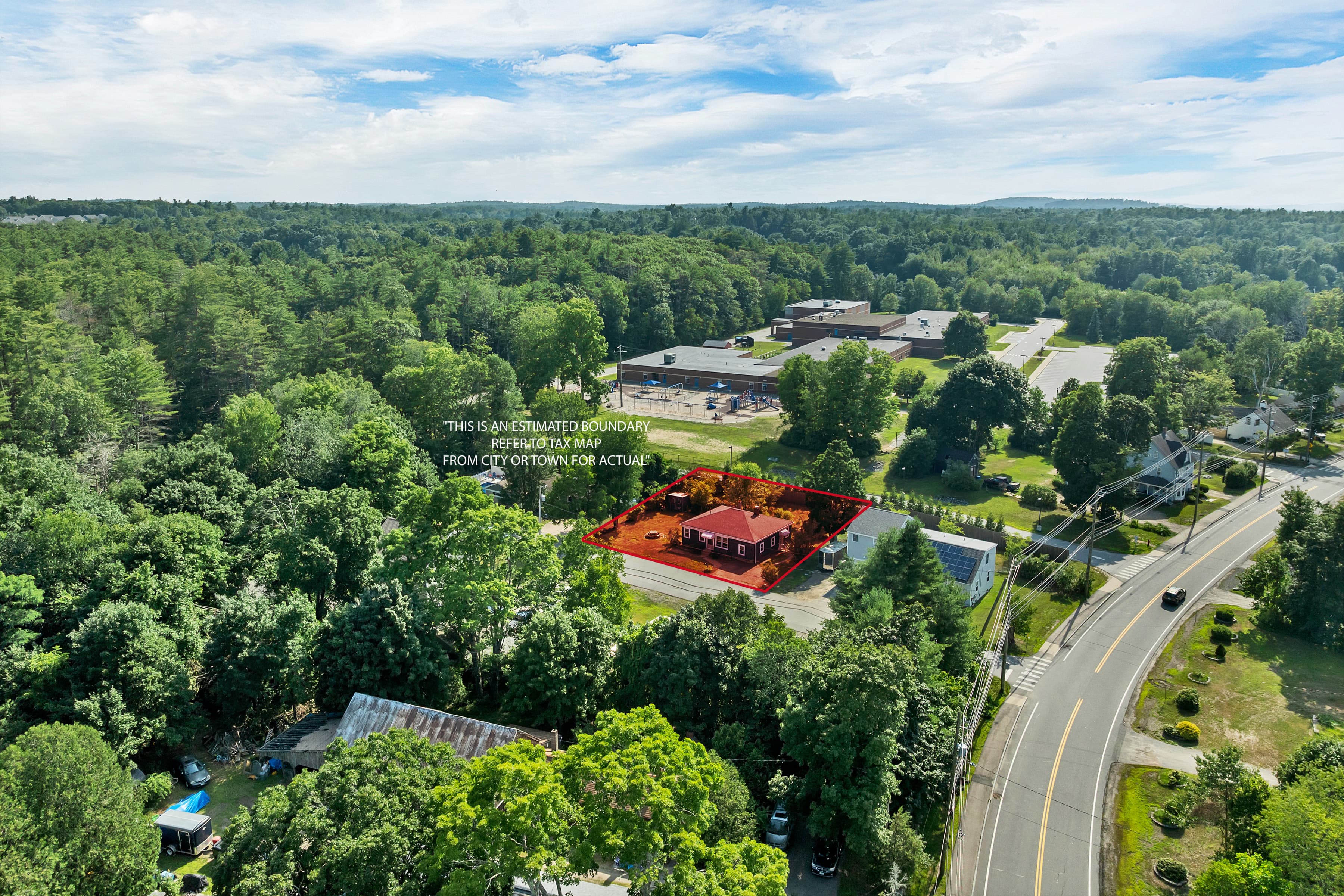 Aerial view of 3 Pond Street with the property boundary outlined, showing the dead-end street, the neighboring school, and the route toward downtown Newmarket